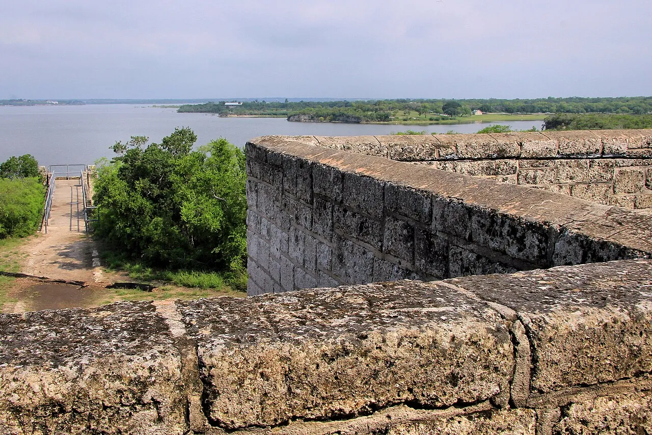 The view of Lake Corpus Christi (technically a reservoir) from the refectory lookout tower at Lake Corpus Christi State Park in San Patricio County, Texas, United States. The Civilian Conservation Corps built the refectory in the 1930s.